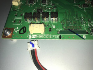 Sharp main board showing component layout before replacement attempt